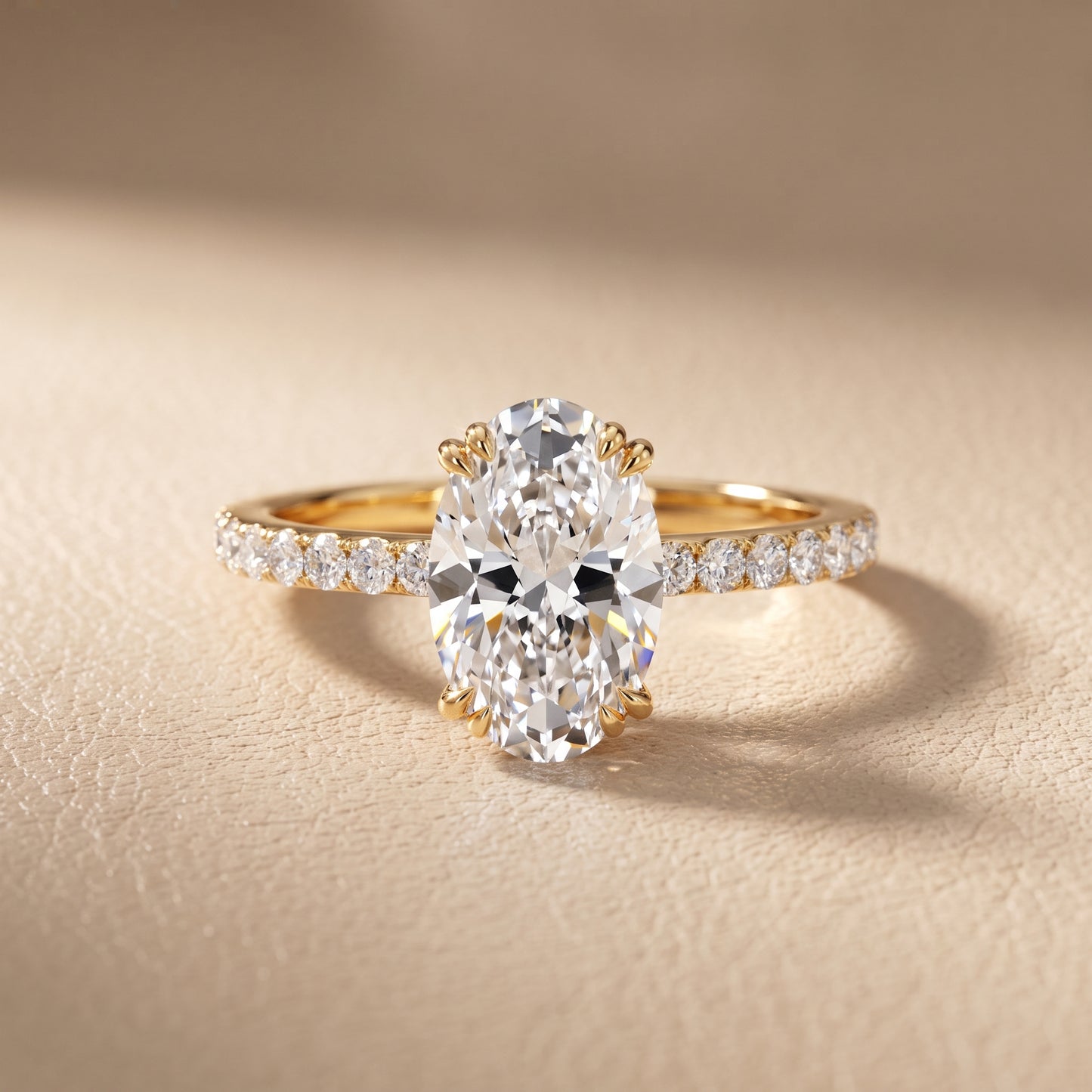 Novara Solitaire Pavé Oval Diamond Ring in Yellow Gold - front.jpg