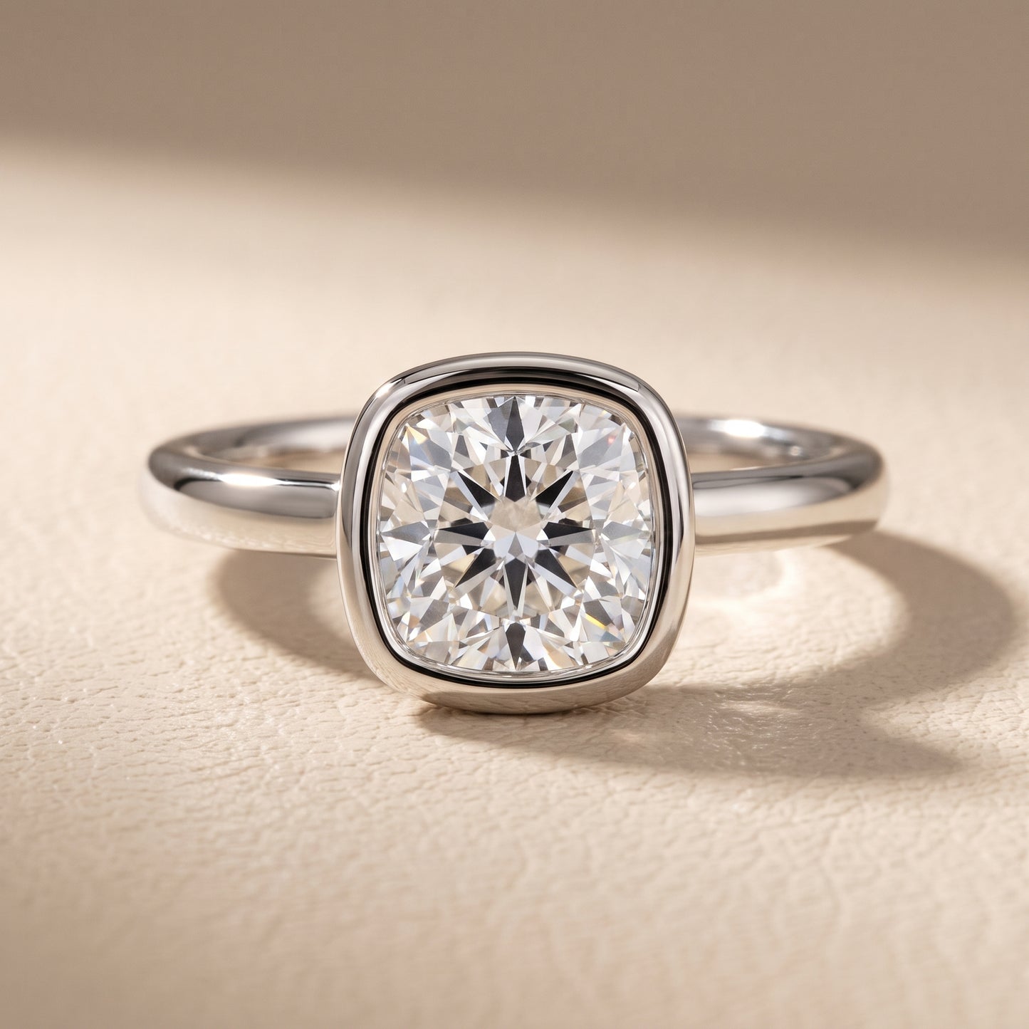 Maeve Bezel Solitaire Cushion Diamond Ring in White Gold - front.jpg