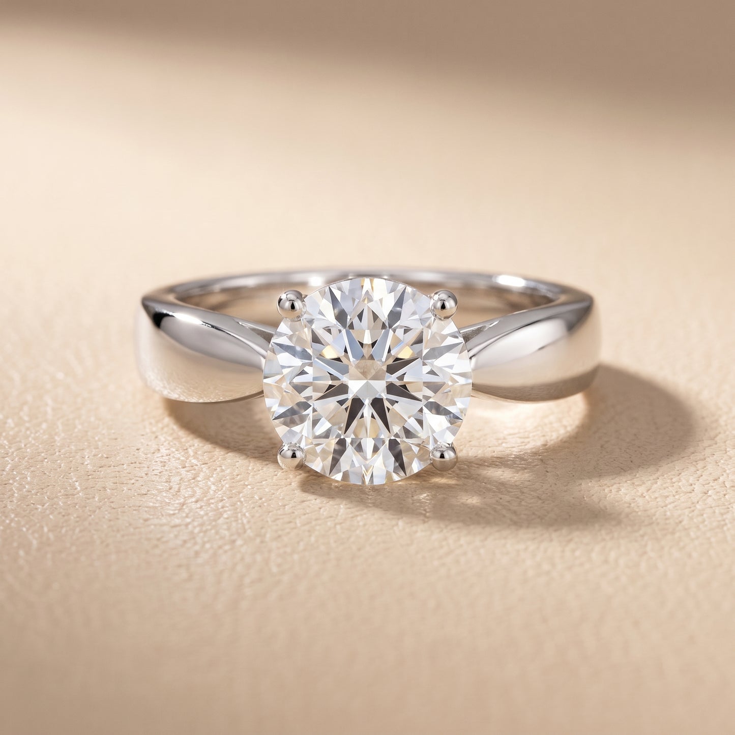 Talia Solitaire Twist Round Diamond Engagement Ring in Platinum - front.jpg