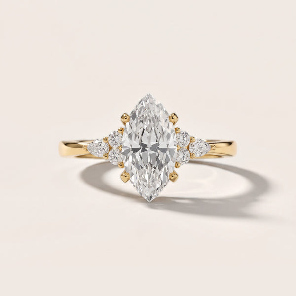Amelia Three Stone Marquise Diamond Engagement Ring in Yellow Gold