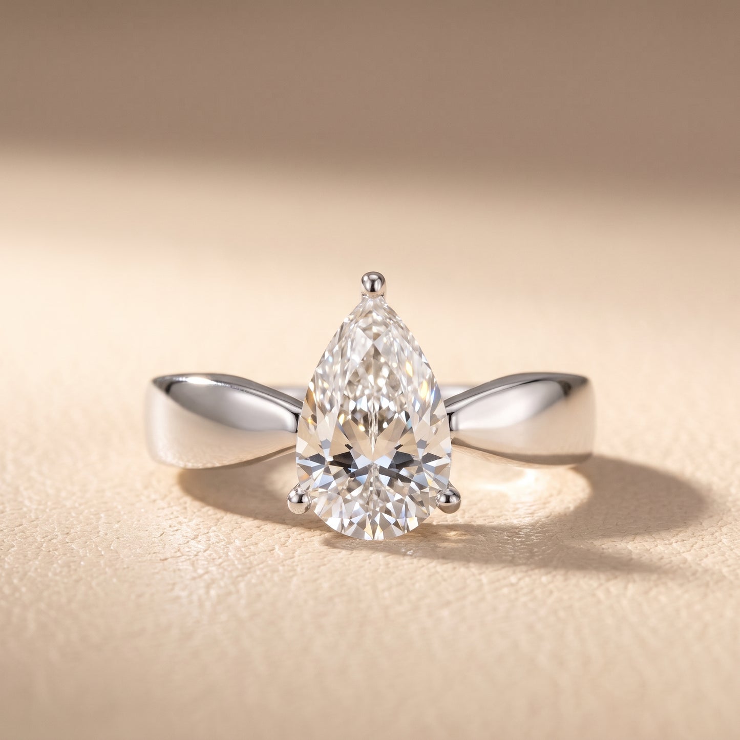 Talia Solitaire Twist Pear Diamond Engagement Ring in White Gold - front.jpg