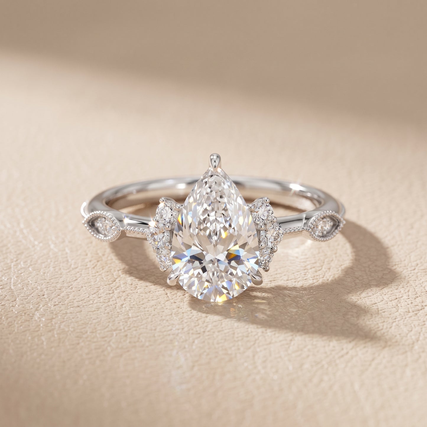 Naomi Vintage Milgrain Pear Diamond Engagement Ring in Silver - front.jpg