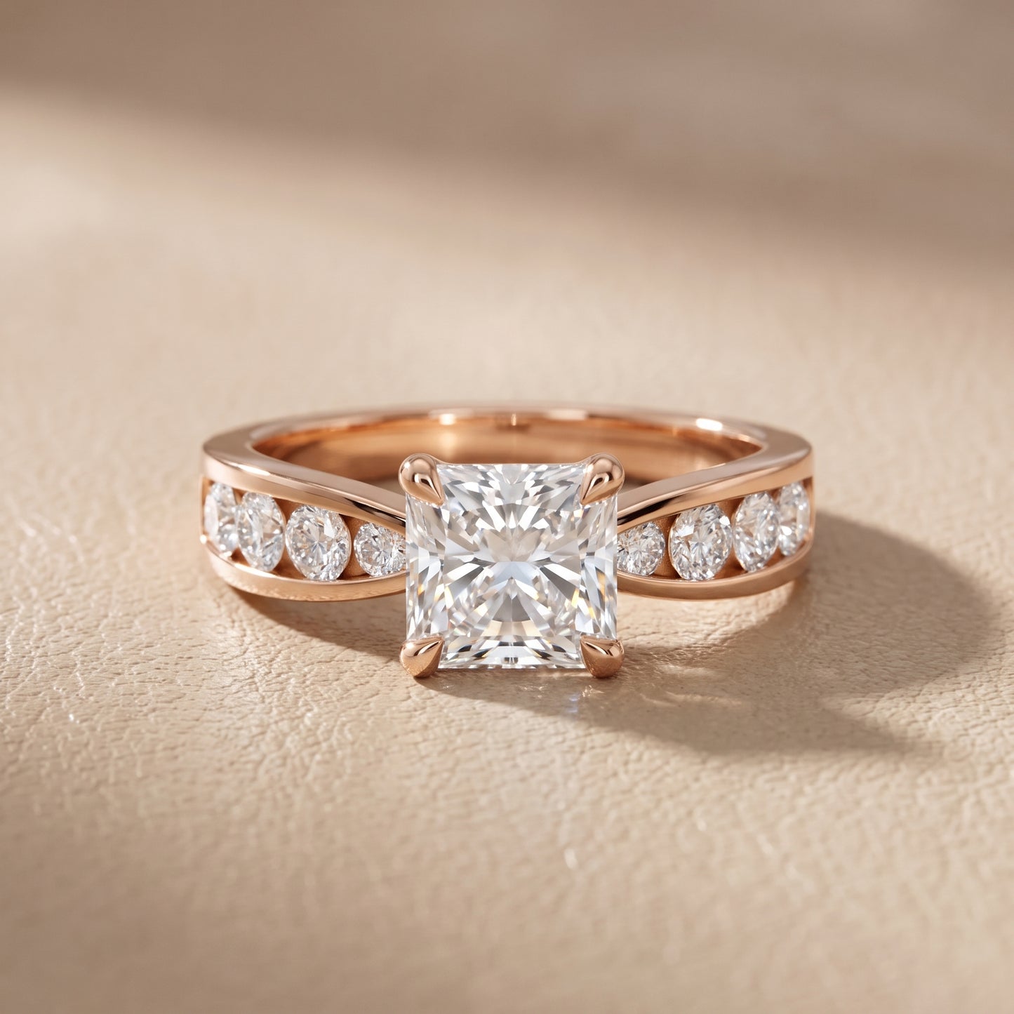 Noor Channel Set Sidestone Radiant Diamond Engagement Ring in Rose Gold - front.jpg