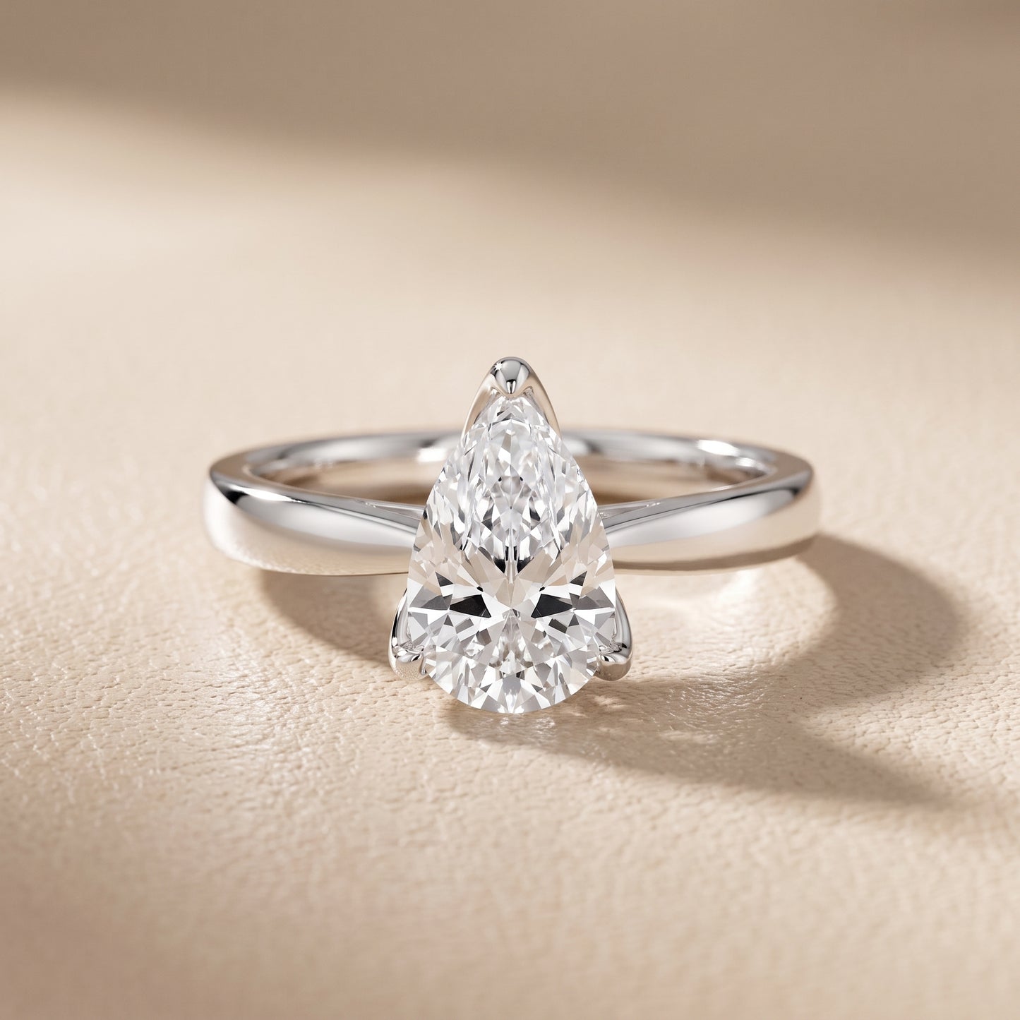 Lucia Solitaire Six-Prong Pear Diamond Engagement Ring in Platinum - front.jpg