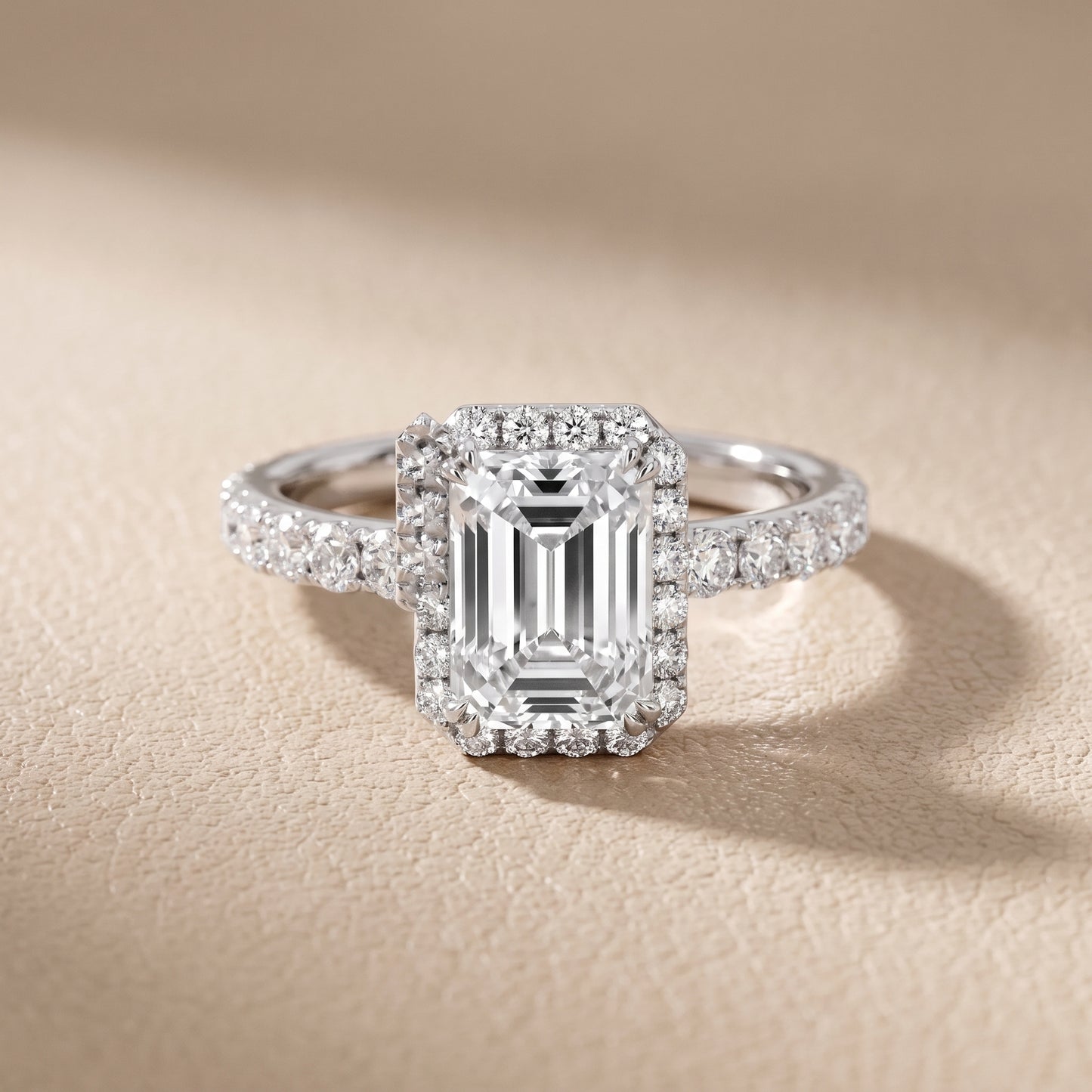 Chloe Halo Pavé Emerald Diamond Ring in Platinum - front.jpg