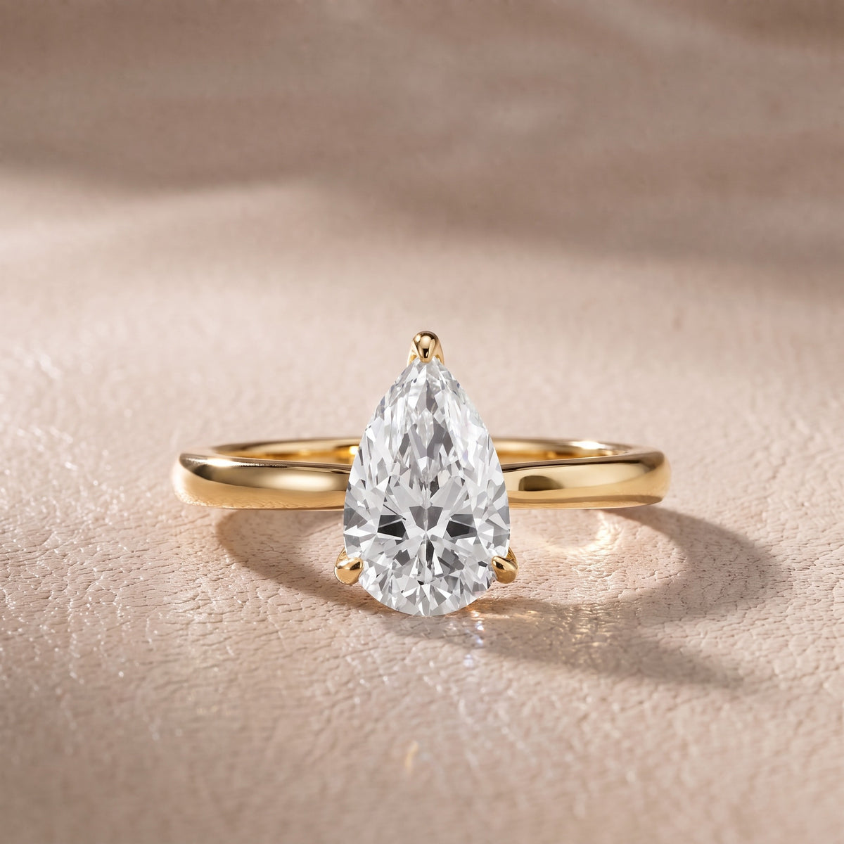 Mena Hidden Halo Pear Diamond Engagement Ring in Yellow Gold - front.jpg