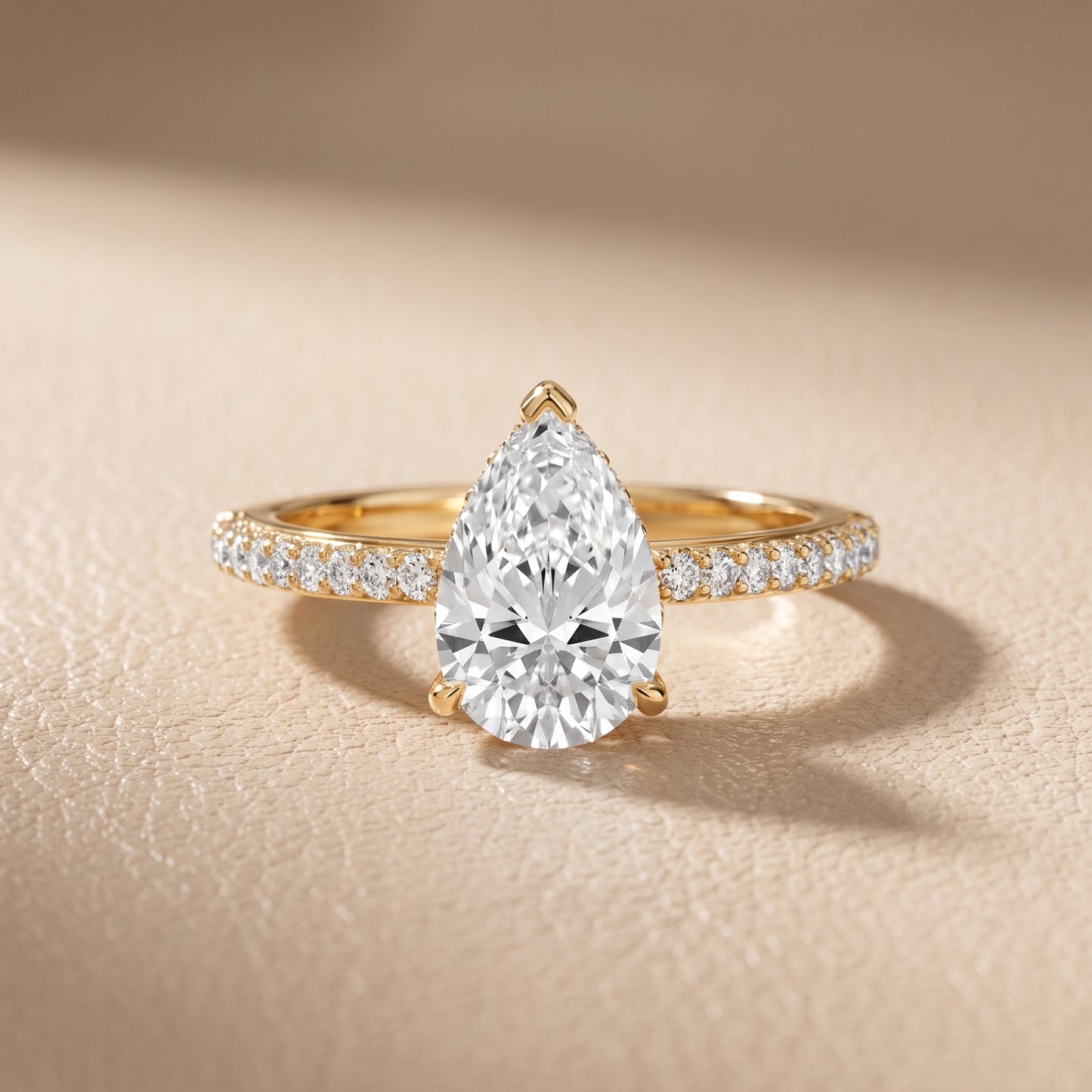 Violet Hidden Halo Pavé Pear Diamond Ring in Yellow Gold - front.jpg