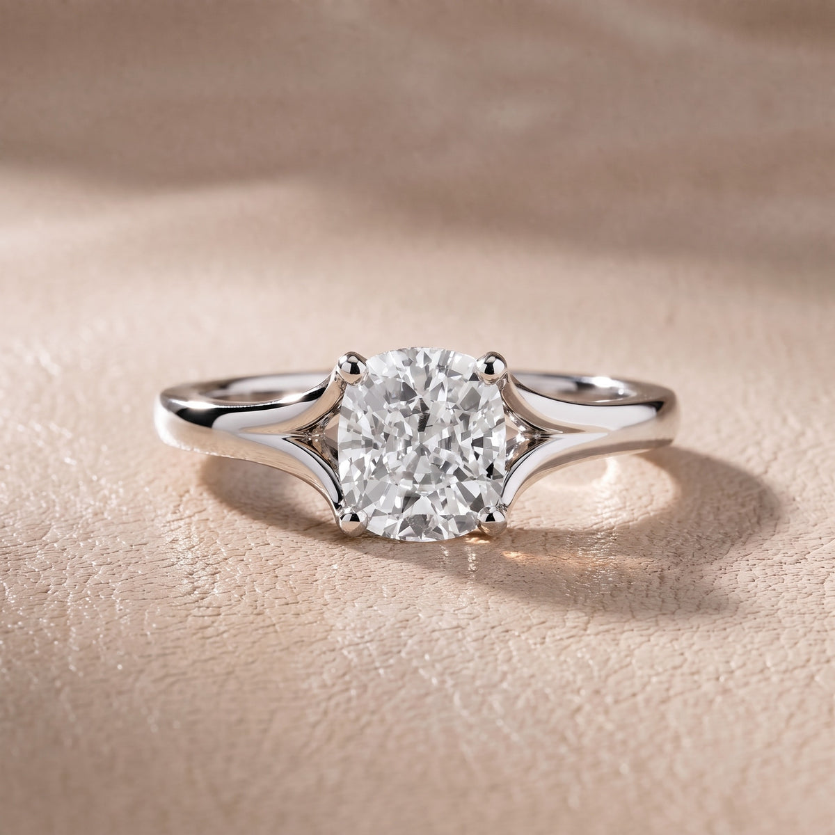 Nell Split Shank Solitaire Cushion Diamond Engagement Ring in Platinum - front.jpg