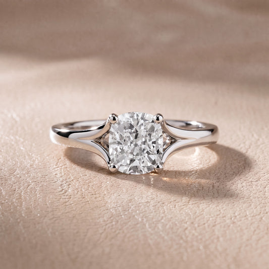 Nell Split Shank Solitaire Cushion Diamond Engagement Ring in Platinum - front.jpg