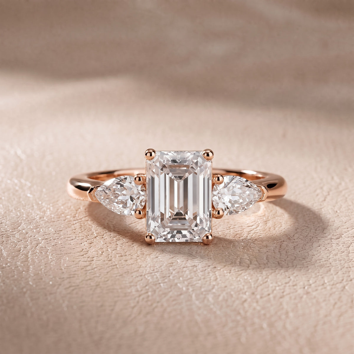 Sophia Three-Stone Emerald Diamond Engagement Ring in Rose Gold - front.jpg