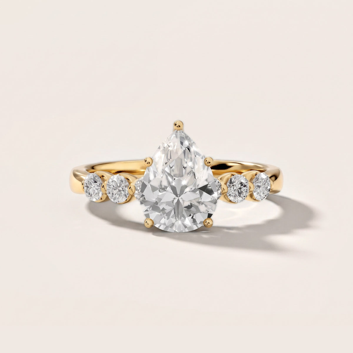 Vienna Floating Five-Stone Pear Diamond Engagement Ring in Yellow Gold - front.jpg