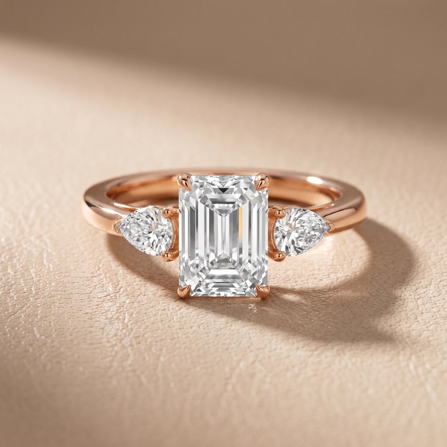 Phoebe Three-Stone Emerald Diamond Ring in Rose Gold - front.jpg