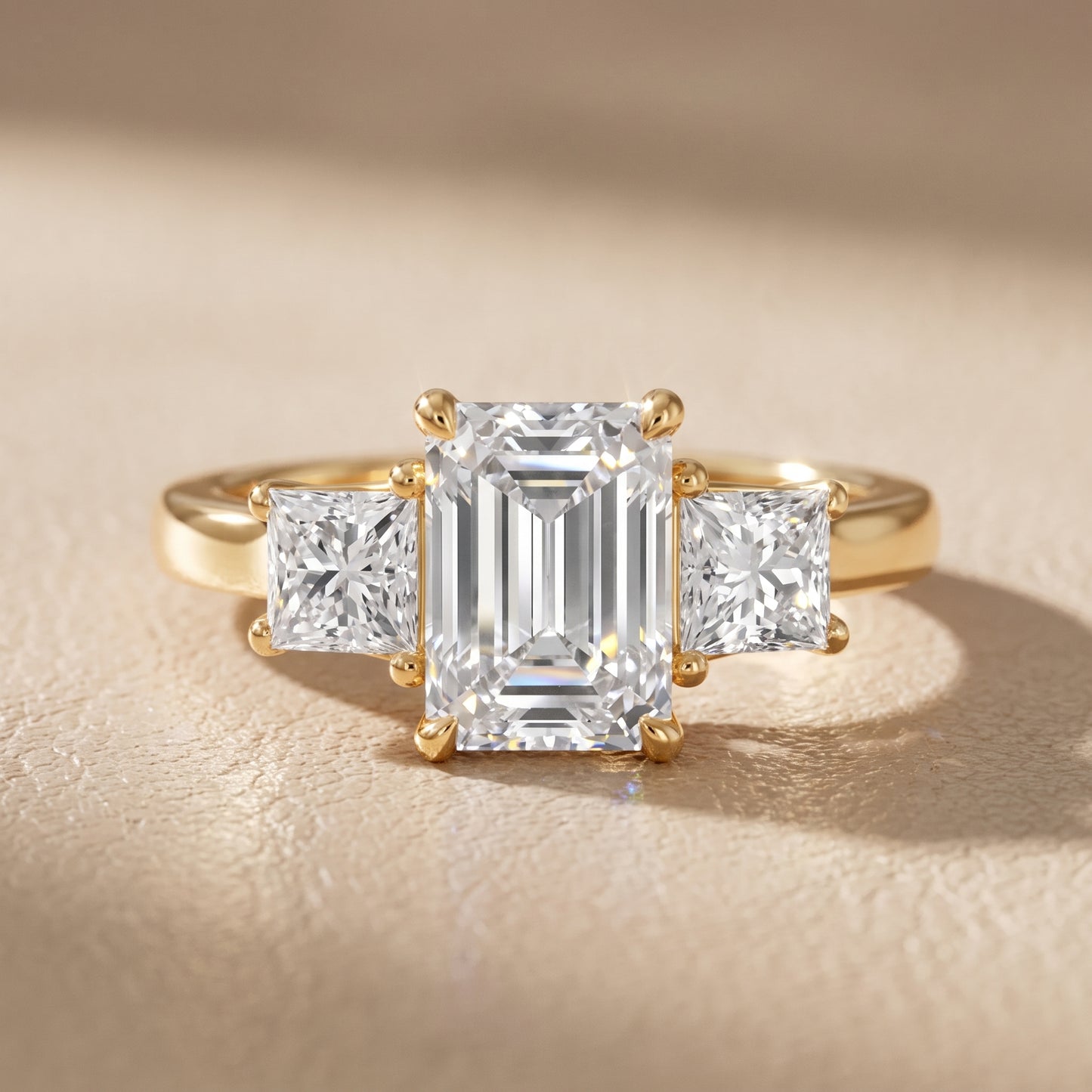 Sienna Three-Stone Emerald Diamond Ring in Yellow Gold - front.jpg