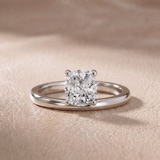 Maisie Four Prong Solitaire Cushion Diamond Engagement Ring in Platinum - front.jpg