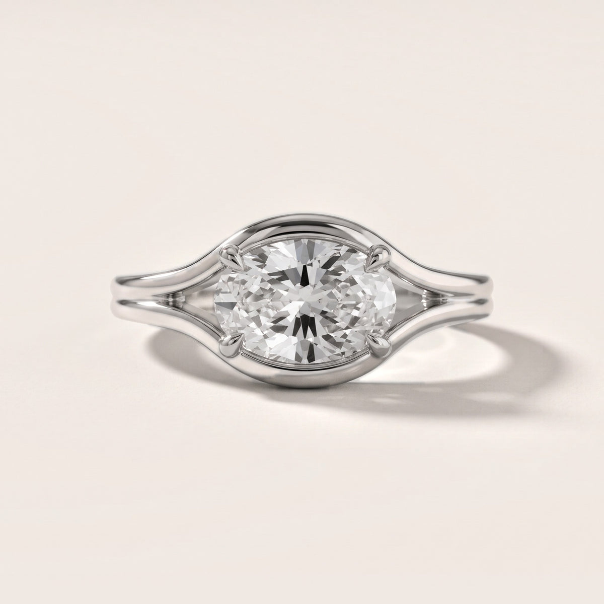 Windsor Half Bezel Solitaire Oval Diamond Engagement Ring in Platinum - front.jpg