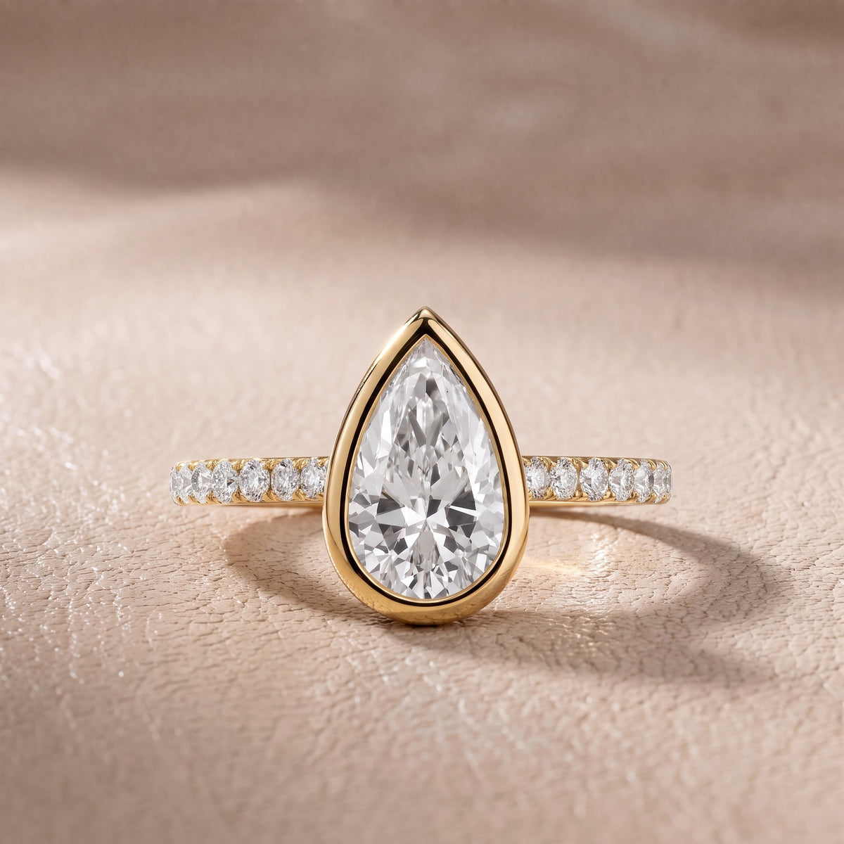 Cora Bezel Pavé Pear Diamond Engagement Ring in Yellow Gold - front.jpg