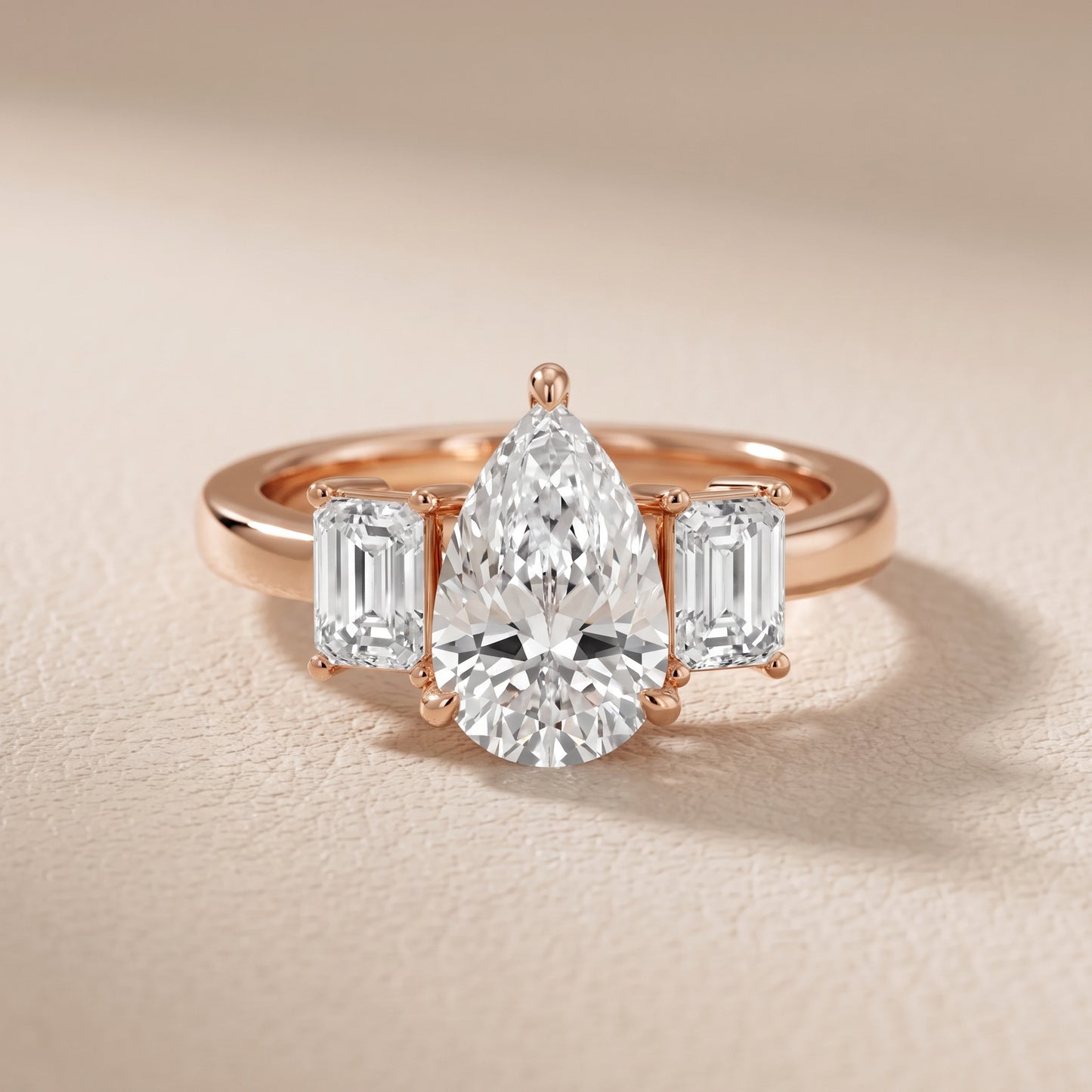 Zoe Three-Stone Pear Diamond Ring in Rose Gold - front.jpg