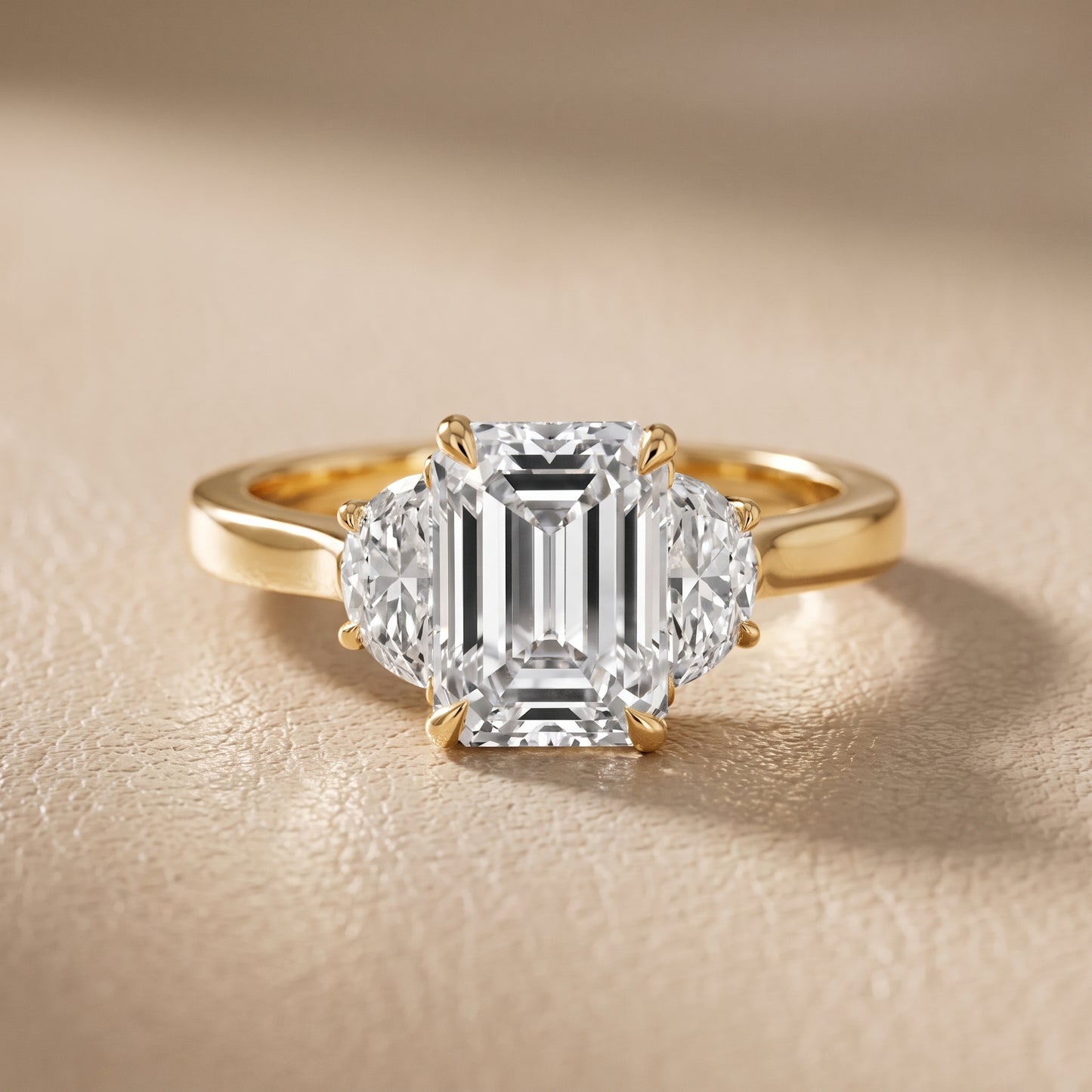 Romy Three-Stone Emerald Diamond Engagement Ring in Yellow Gold - front.jpg