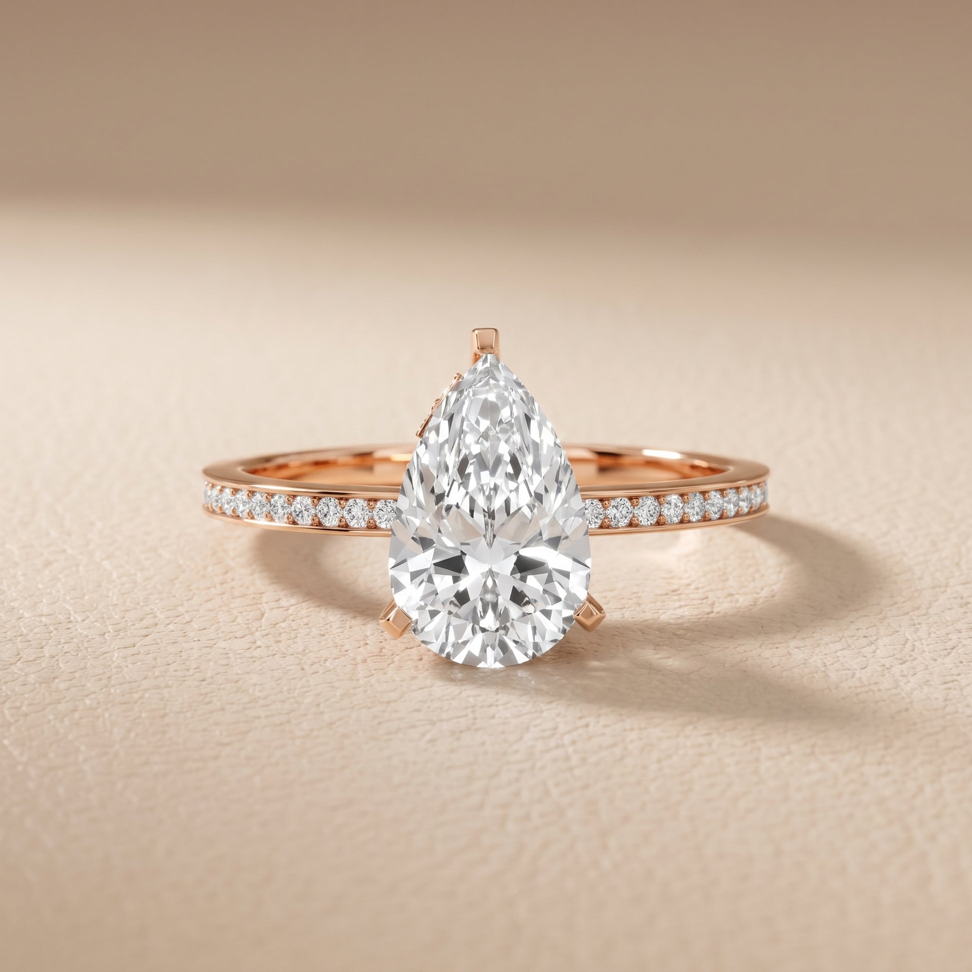 Naia Hidden Halo Pear Diamond Ring in Rose Gold - front.jpg