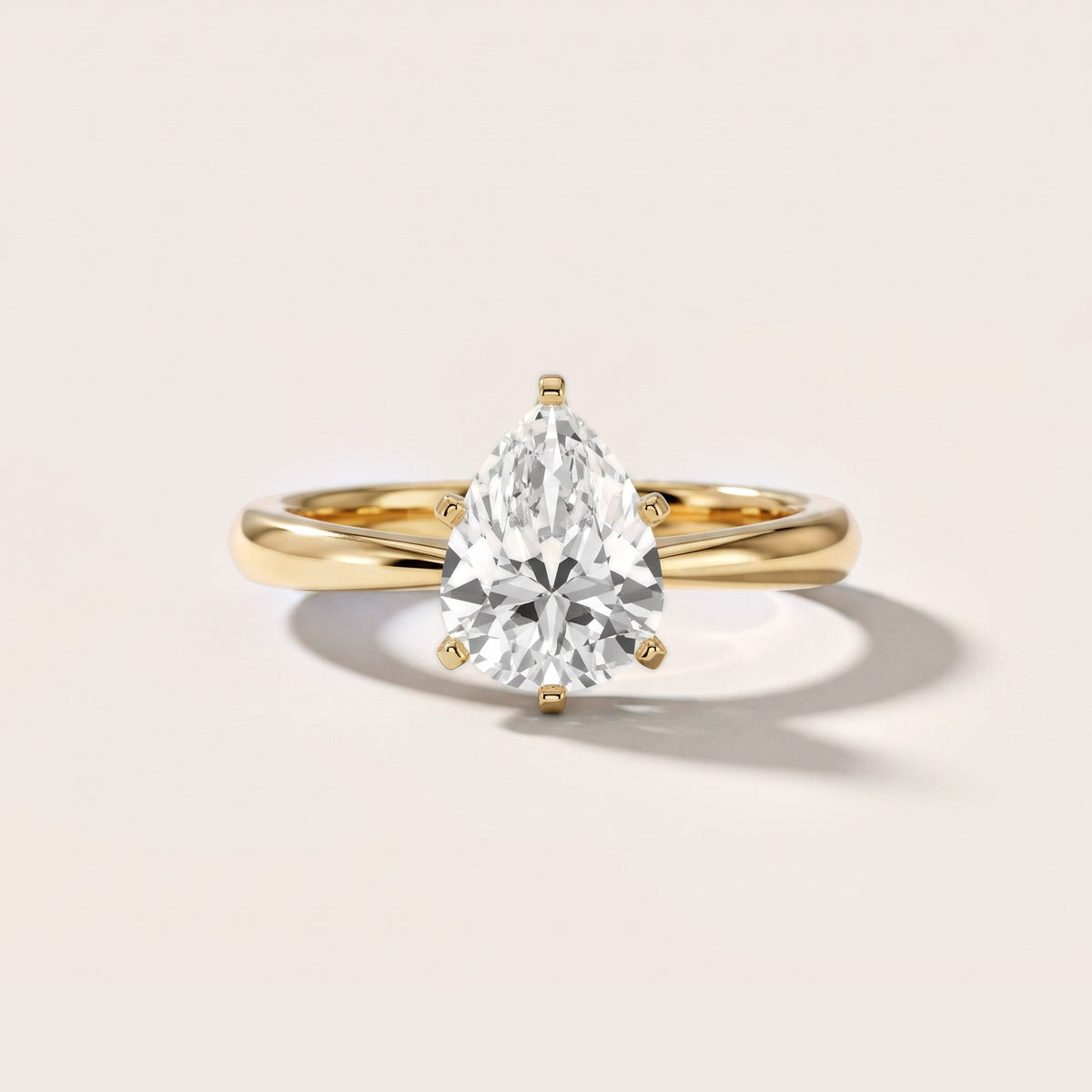 Arlette Solitaire Knife Edge Pear Diamond Engagement Ring in Yellow Gold - front.jpg