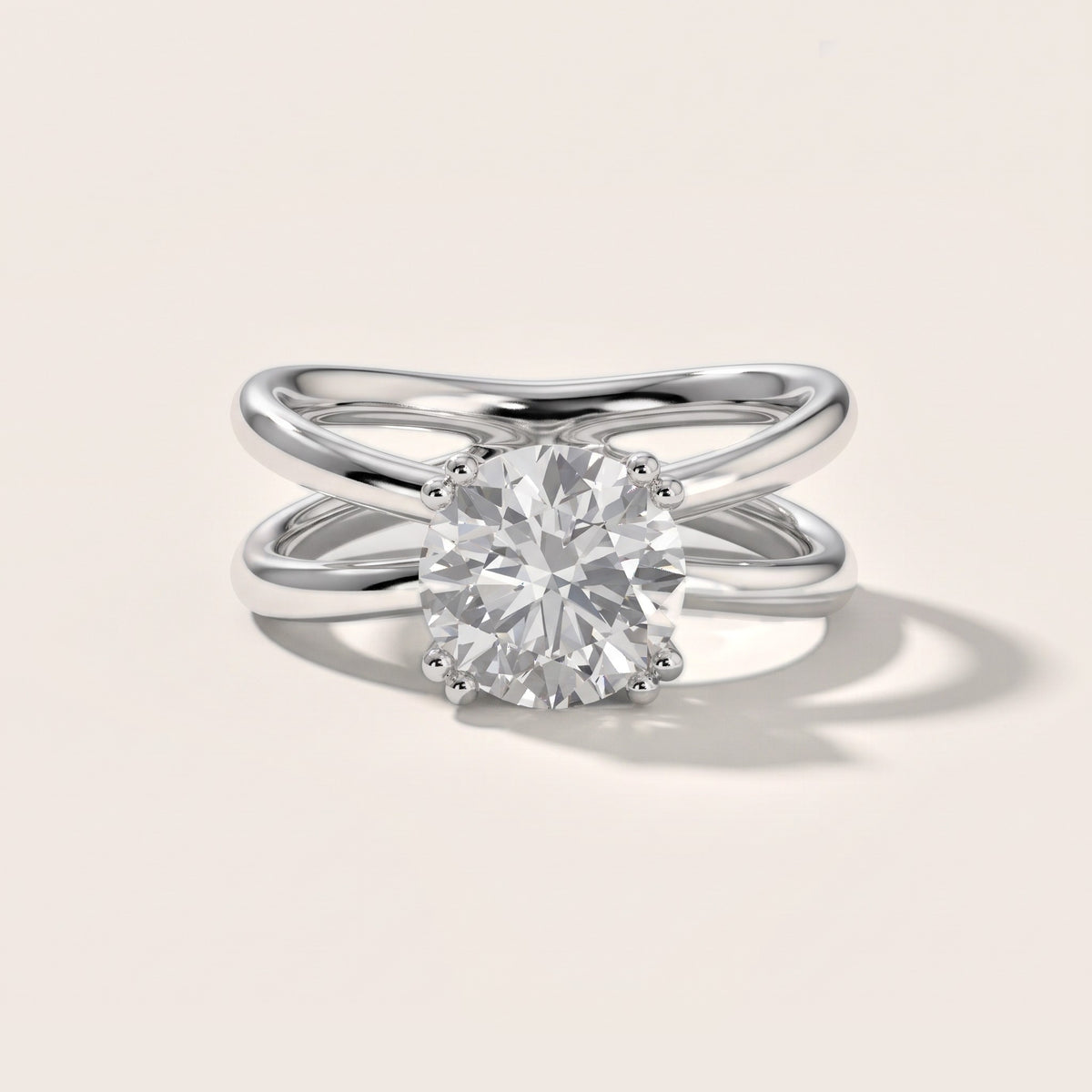 Yvonne Crossover Solitaire Round Diamond Engagement Ring in Platinum - front.jpg