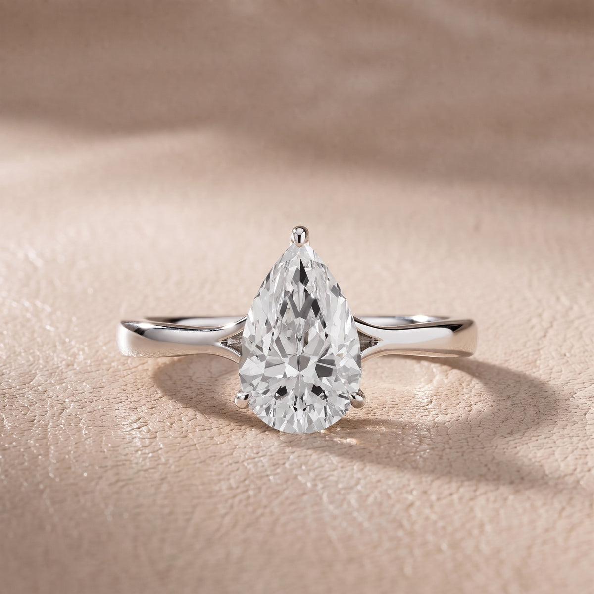Evangeline Trellis Solitaire Pear Diamond Engagement Ring in Silver - front.jpg