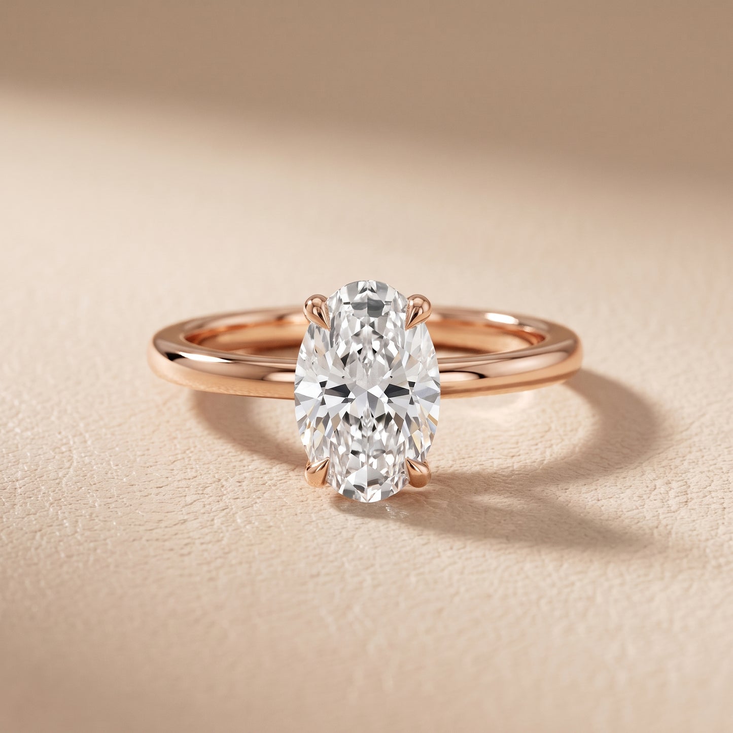 Nella Petite Solitaire Oval Diamond Engagement Ring in Rose Gold - front.jpg