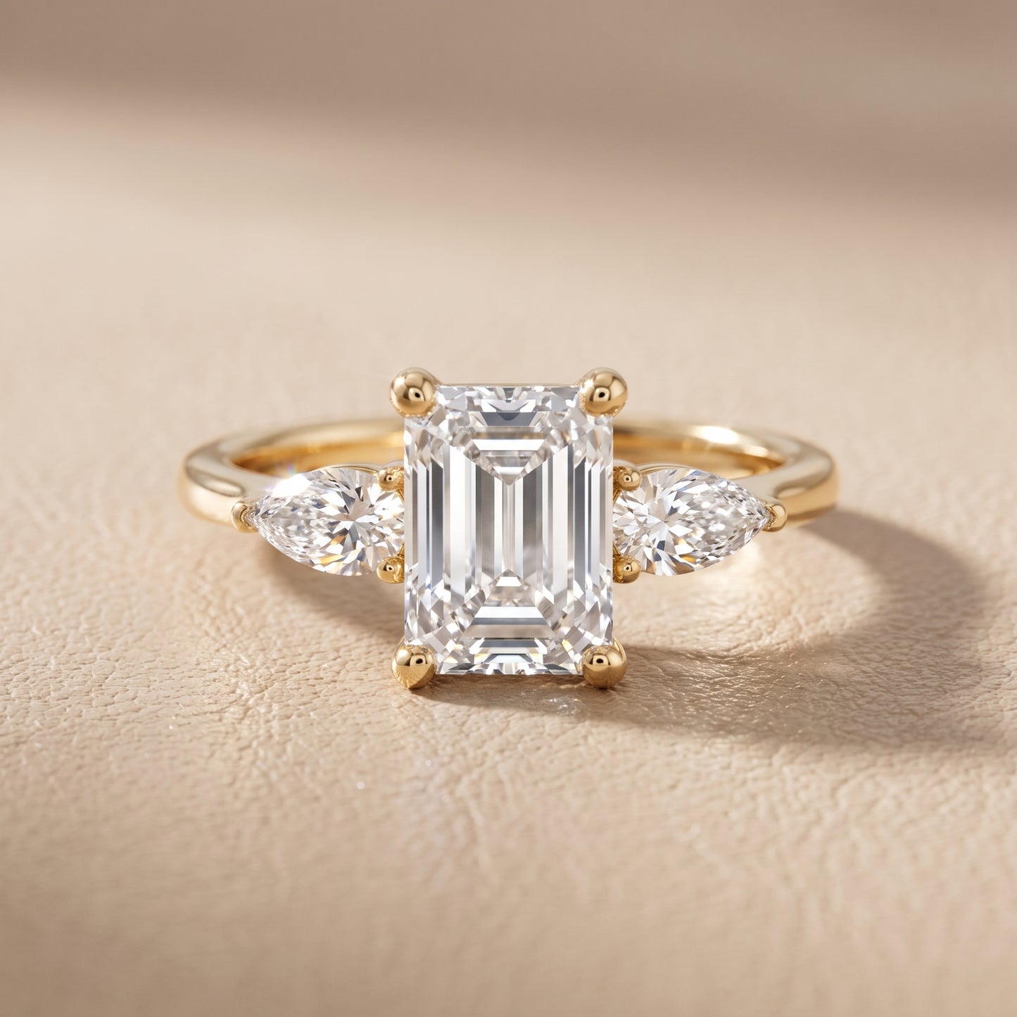 Faye Three-Stone Trellis Emerald Diamond Ring in Yellow Gold - front.jpg