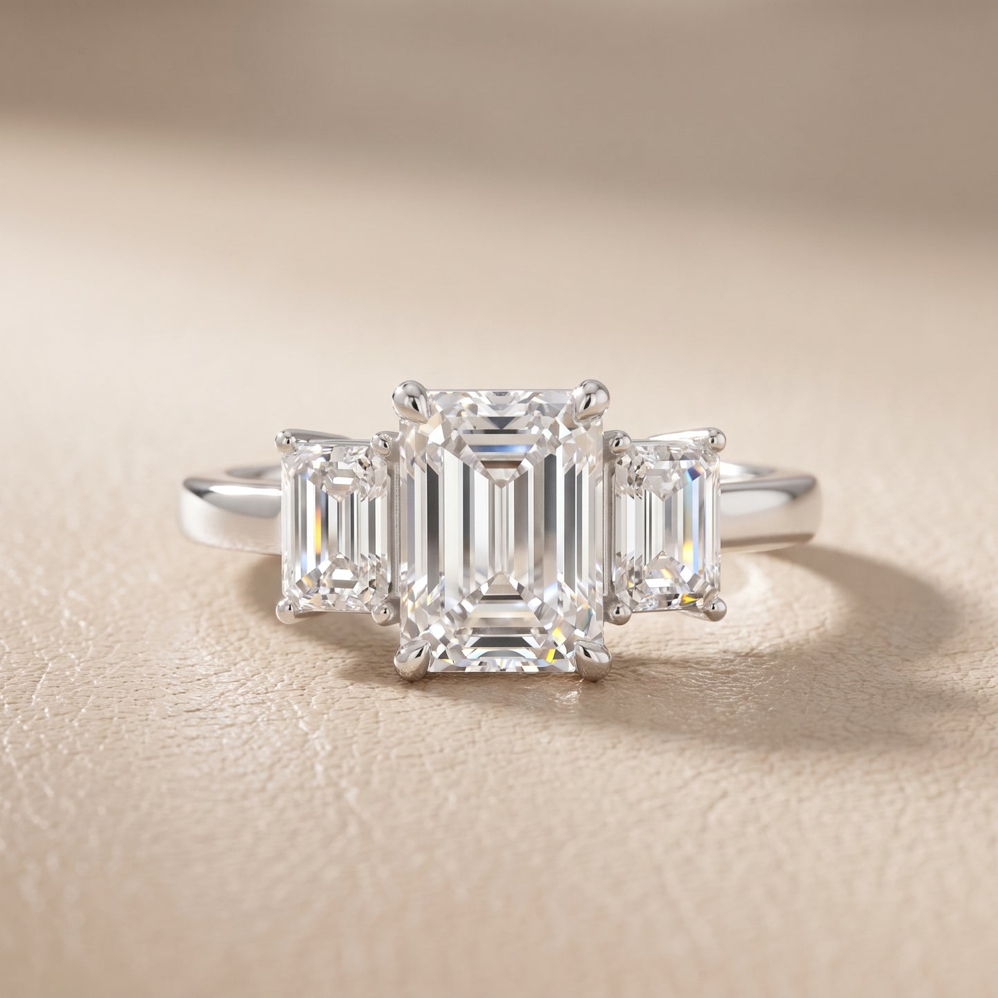 Zoe Three-Stone Emerald Diamond Ring in Platinum - front.jpg