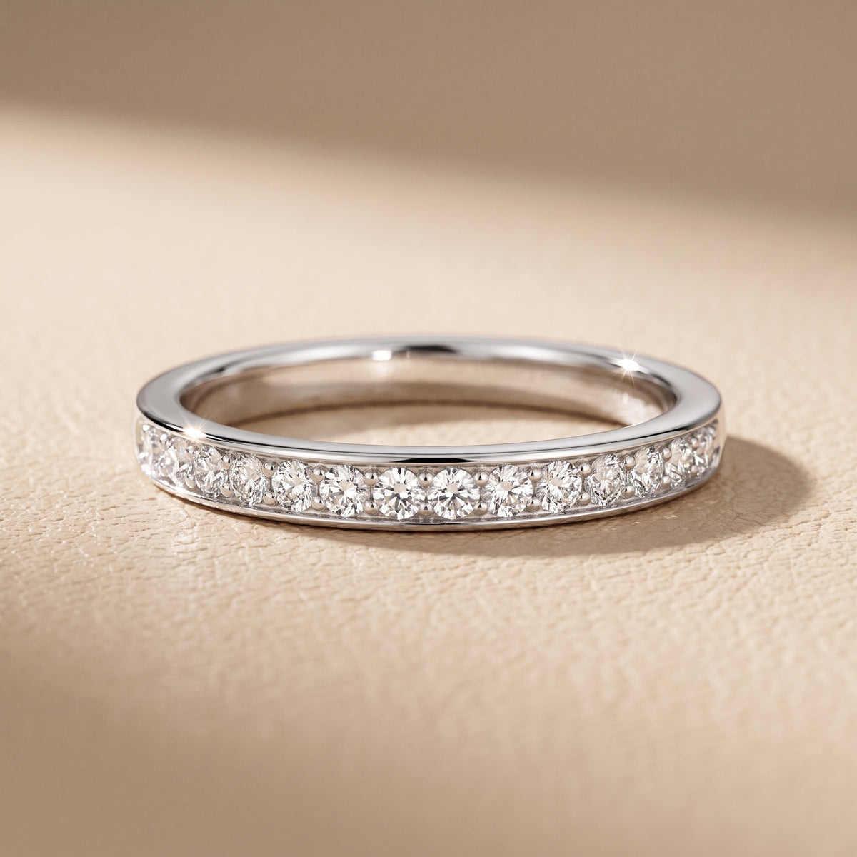 Tosca Tapered Riviera Round Diamond Half Eternity Band in Platinum - front.jpg