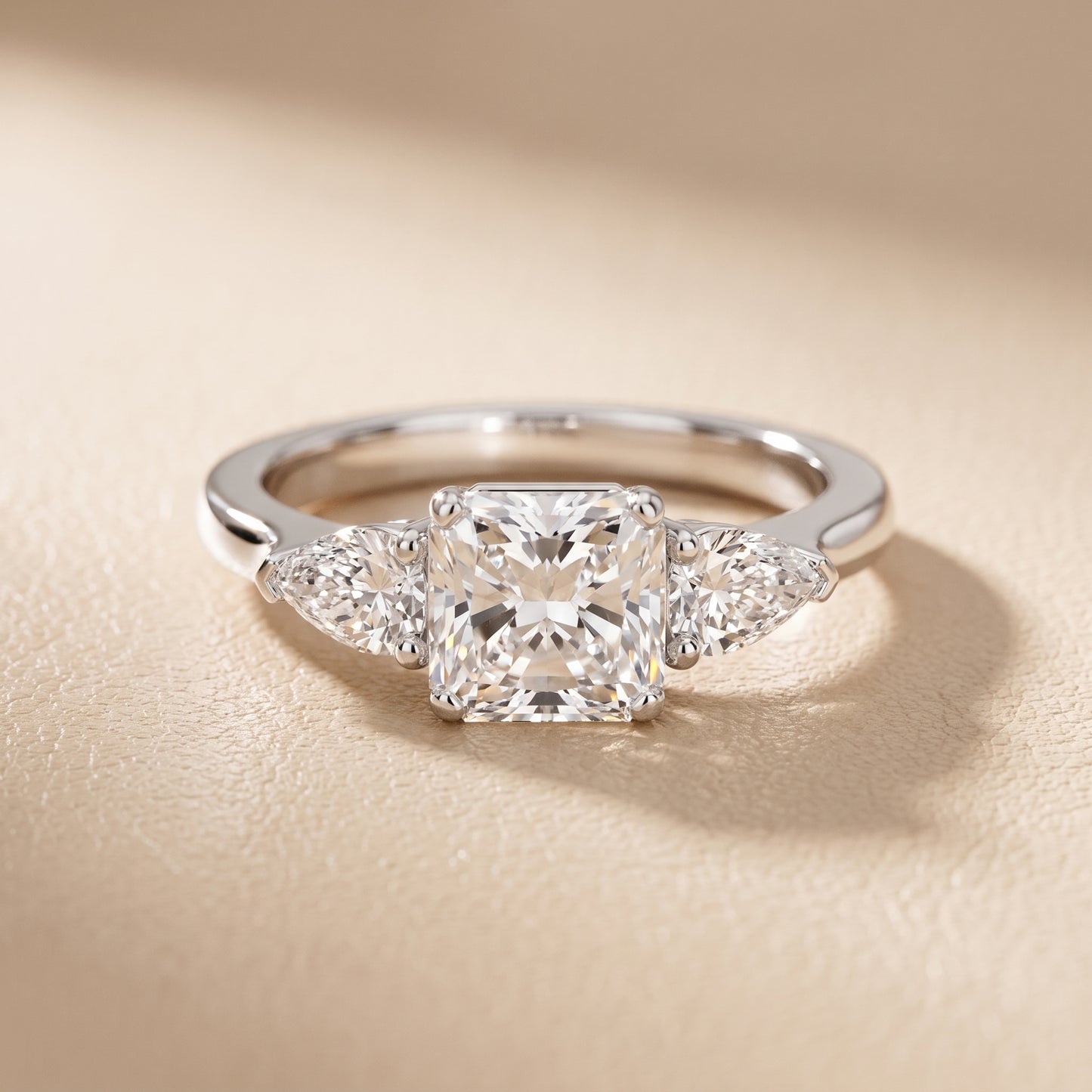Mirabel Three-Stone Radiant Diamond Engagement Ring in White Gold - front.jpg