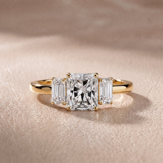Marian Three-Stone Hidden Halo Radiant Diamond Engagement Ring in Yellow Gold - front.jpg