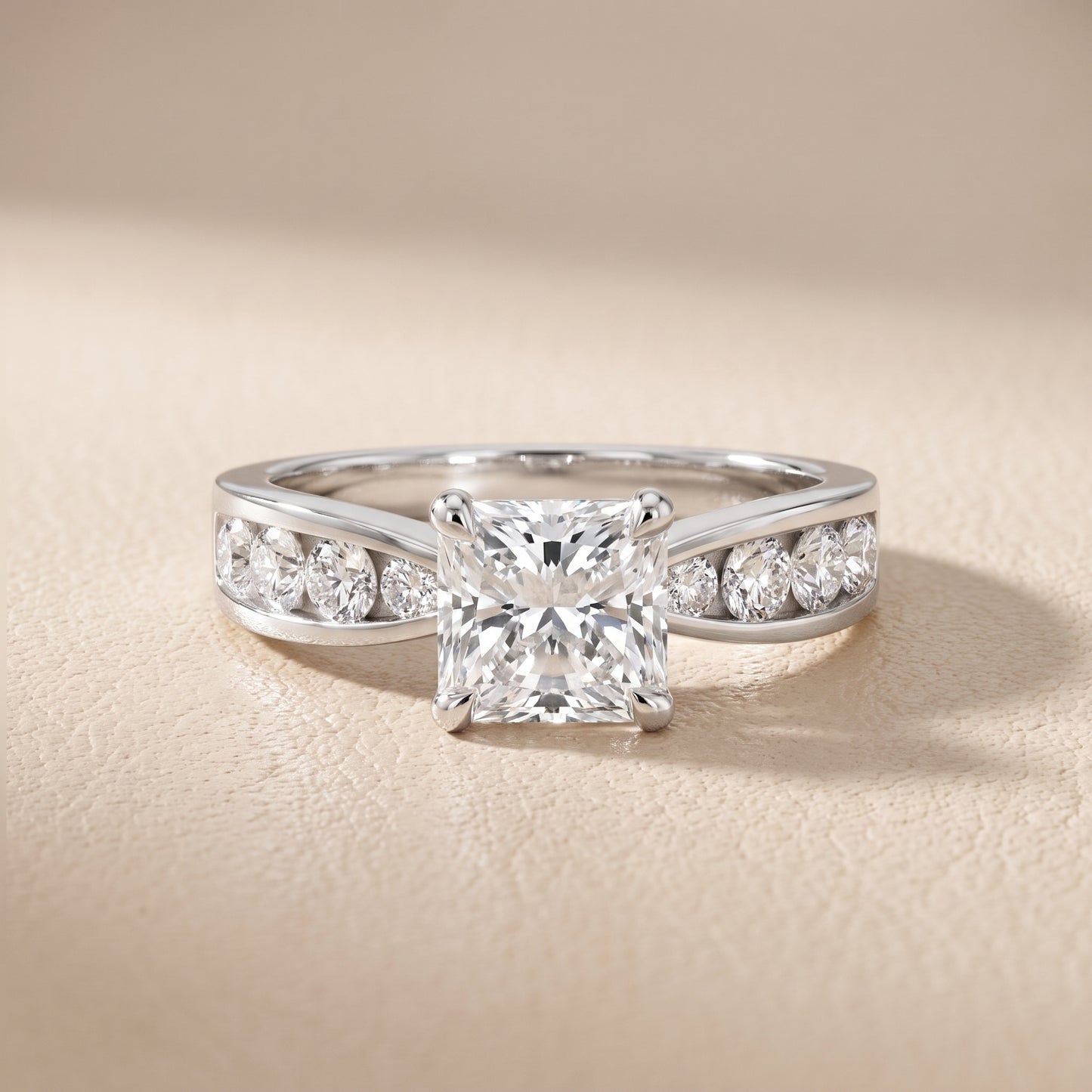 Noor Channel Set Sidestone Radiant Diamond Engagement Ring in Platinum - front.jpg