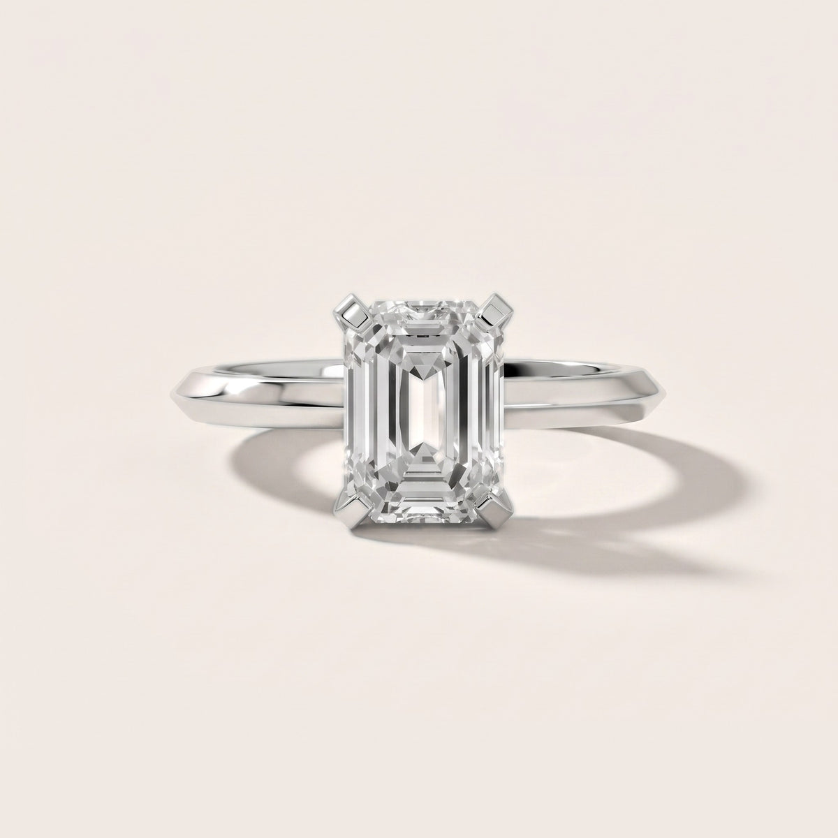 Verity Solitaire Knife Edge Emerald Diamond Engagement Ring in White Gold - front.jpg