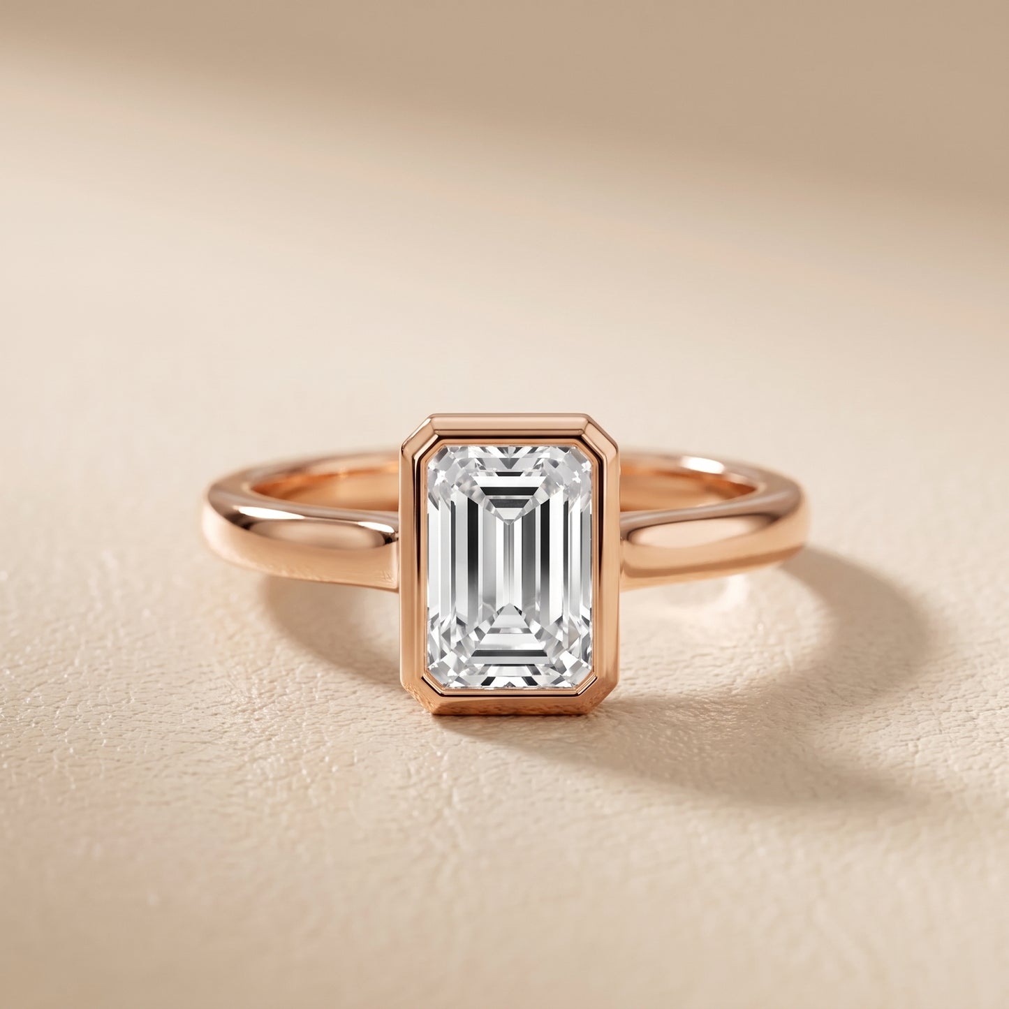 Jolie Bezel Solitaire Emerald Diamond Engagement Ring in Rose Gold - front.jpg