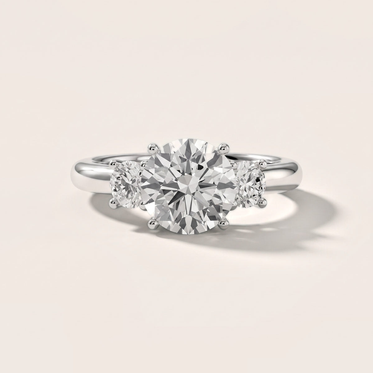 Gemma Three-Stone Round Diamond Engagement Ring in White Gold - front.jpg
