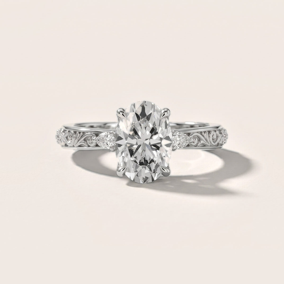 Siesta Three-Stone Engraved Oval Diamond Engagement Ring in Silver - front.jpg