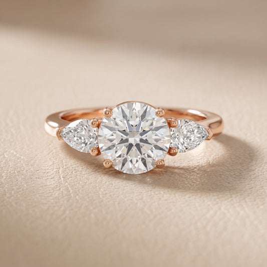 Mirabel Three-Stone Round Diamond Engagement Ring in Rose Gold - front.jpg