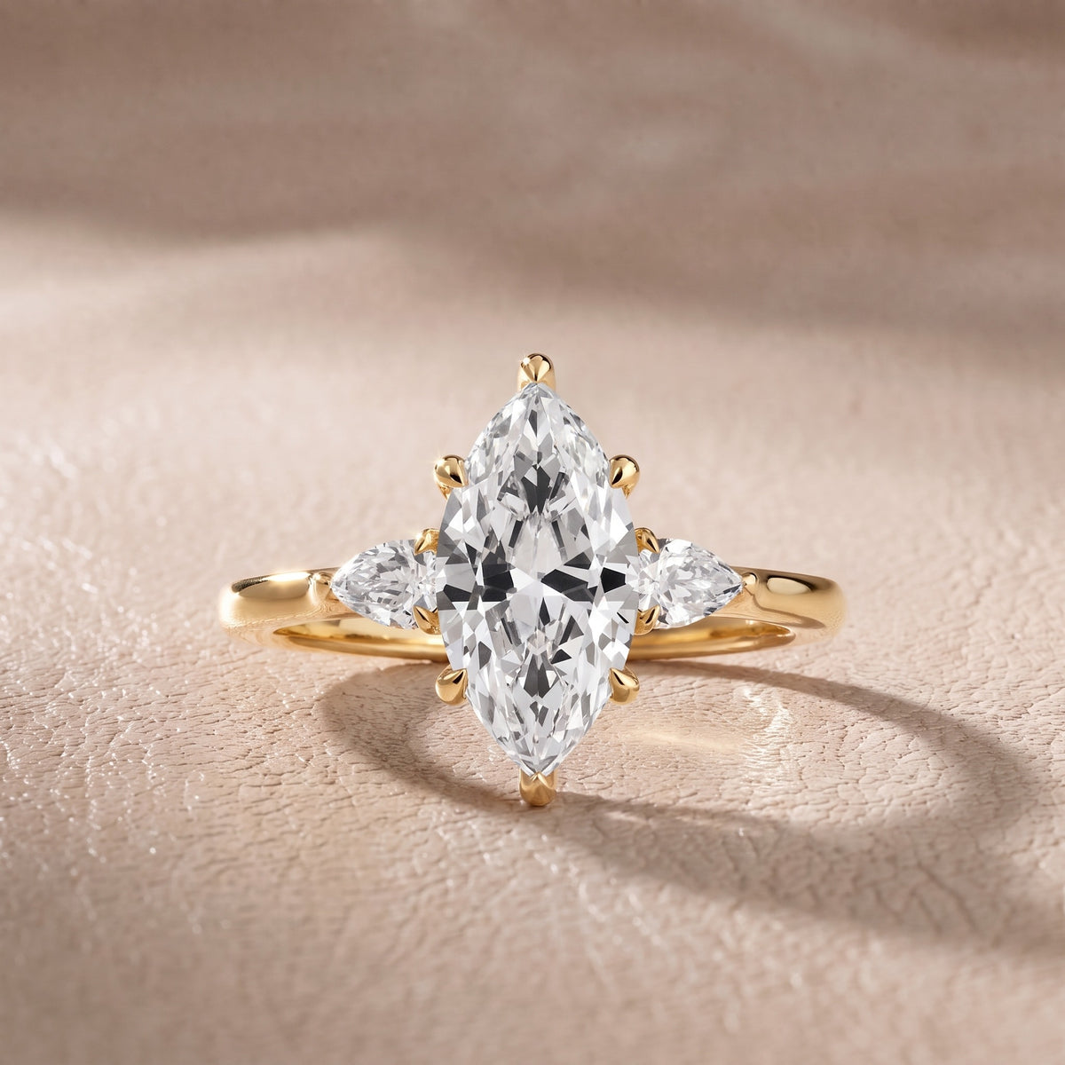 Leila Three-Stone Marquise Diamond Engagement Ring in Yellow Gold - front.jpg