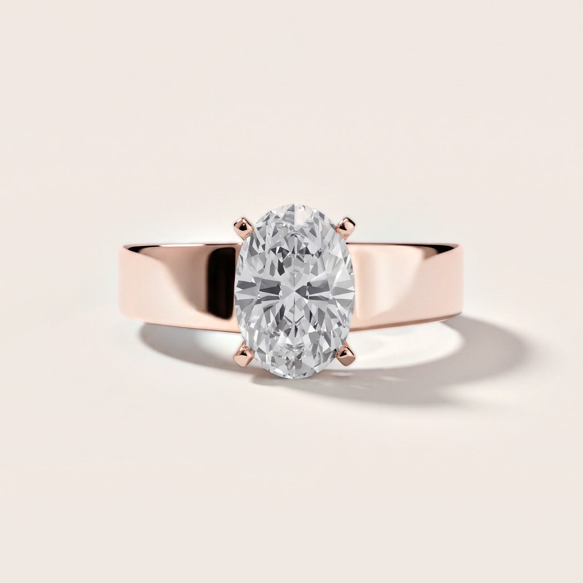 Susannah Wide Band Solitaire Oval Diamond Engagement Ring in Rose Gold - front.jpg