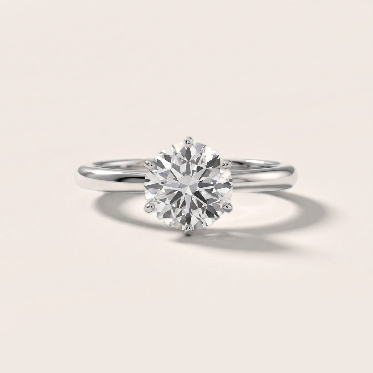 Agatha Solitaire Cathedral Round Diamond Engagement Ring in Platinum - front.jpg