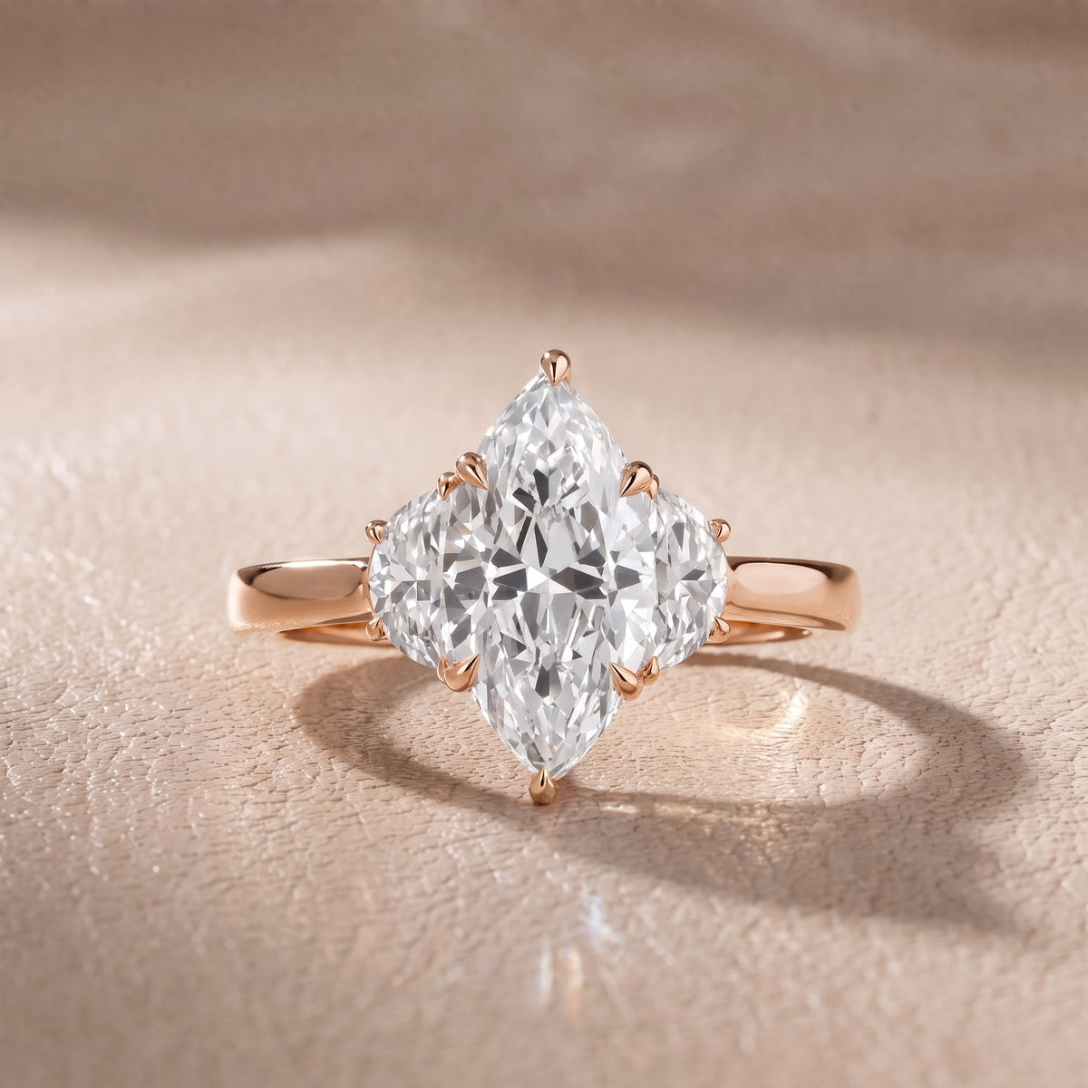 Romy Three-Stone Marquise Diamond Engagement Ring in Rose Gold - front.jpg