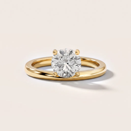 Maisie Four Prong Solitaire Round Diamond Engagement Ring in Yellow Gold