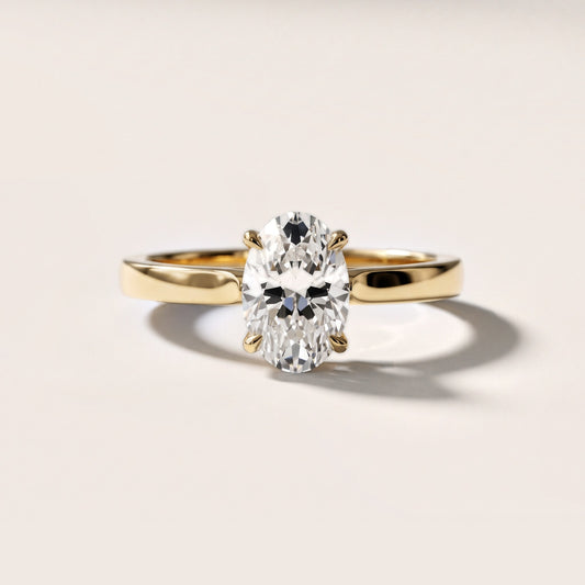 Isabella Bloom Solitaire Oval Diamond Engagement Ring in Yellow Gold