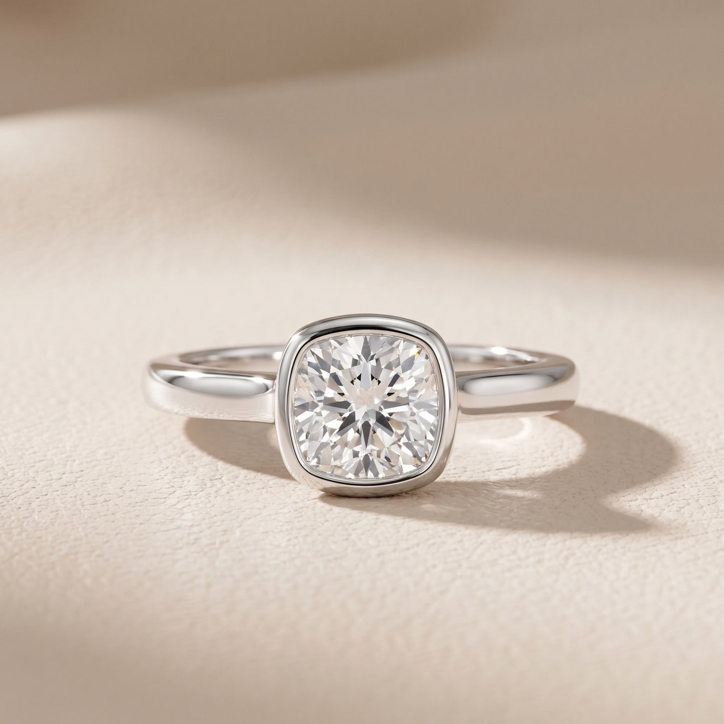 Jolie Bezel Solitaire Cushion Diamond Engagement Ring in Silver - front.jpg