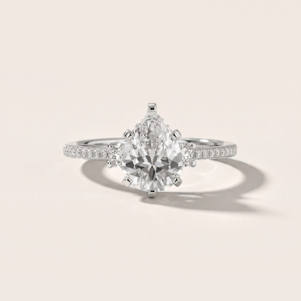 Nerissa Three-Stone Micropavé Pear Diamond Engagement Ring in Silver - front.jpg
