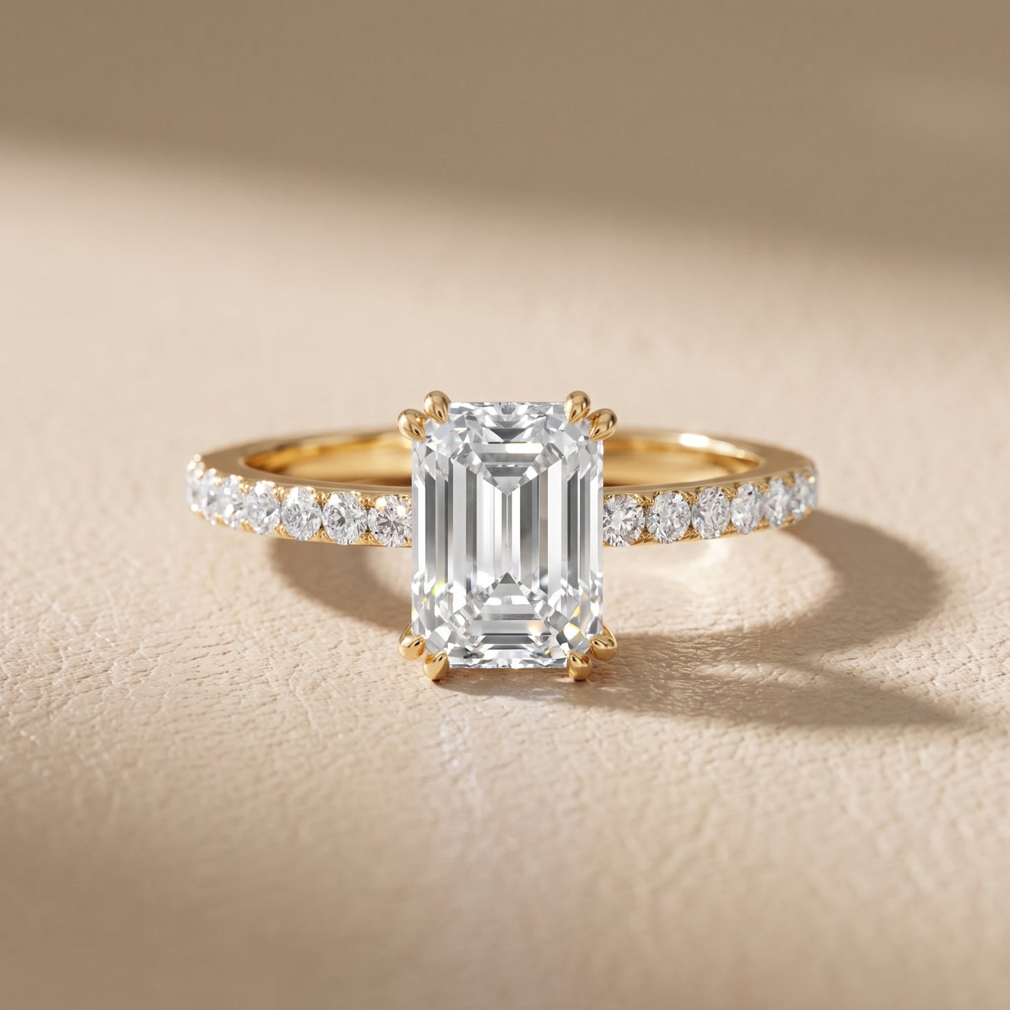 Novara Solitaire Pavé Emerald Diamond Ring in Yellow Gold - front.jpg
