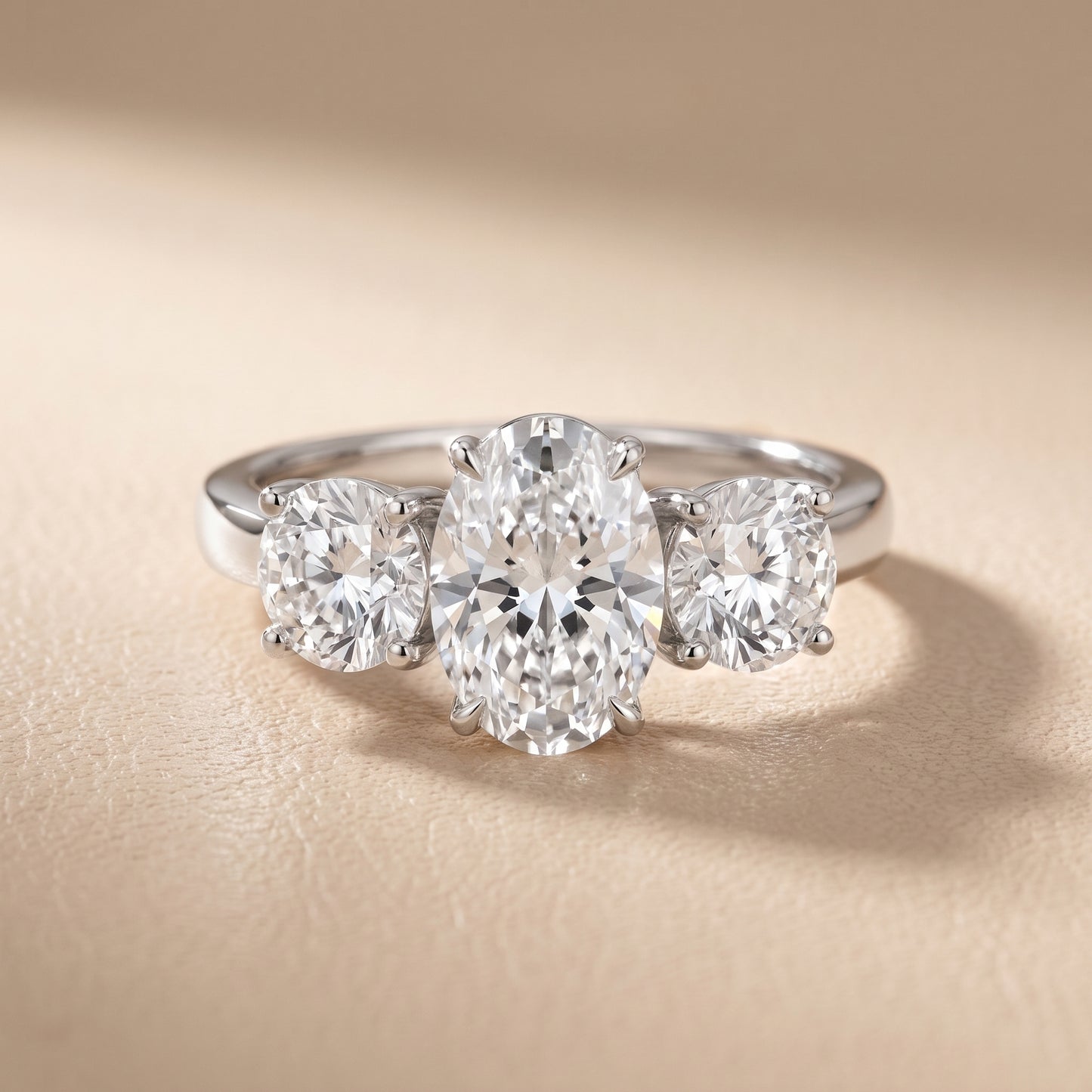 Esme Three-Stone Tapered Oval Diamond Ring in White Gold - front.jpg
