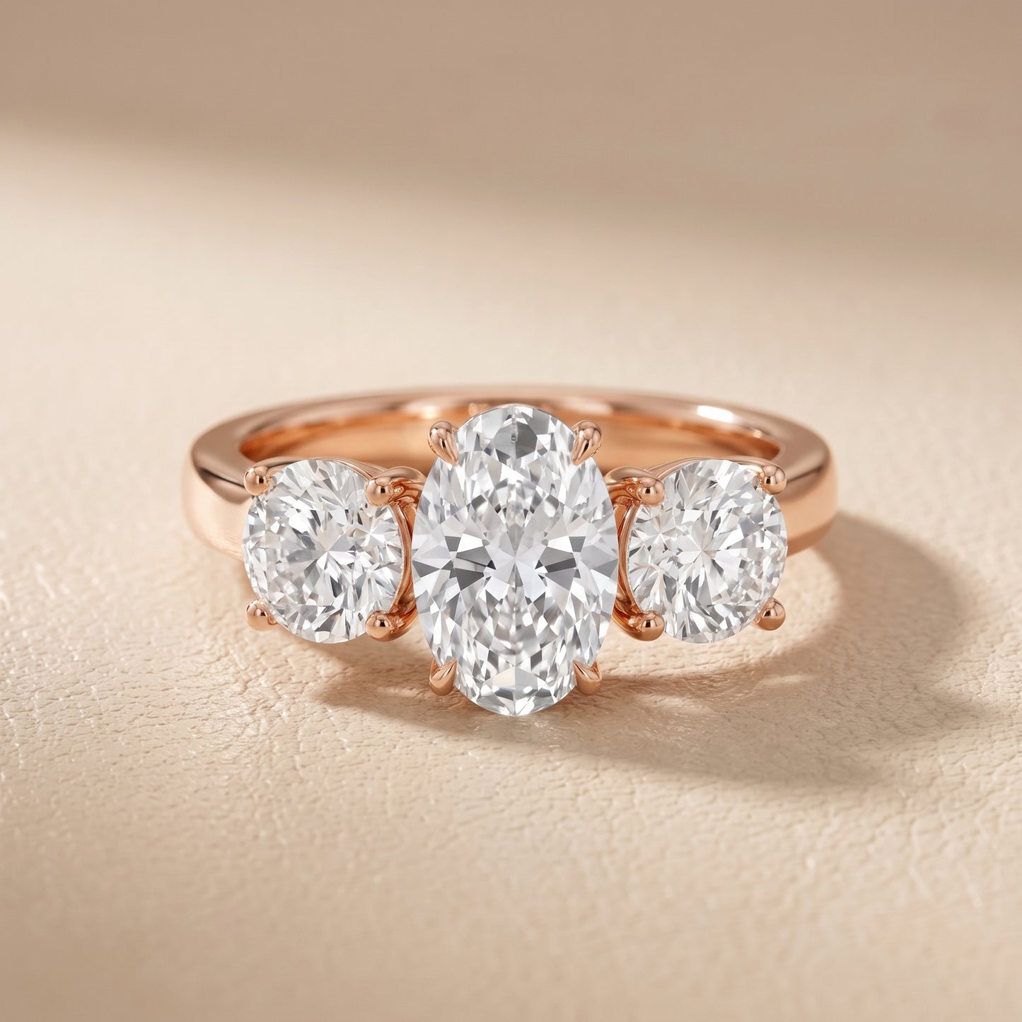 Esme Three-Stone Tapered Oval Diamond Ring in Rose Gold - front.jpg
