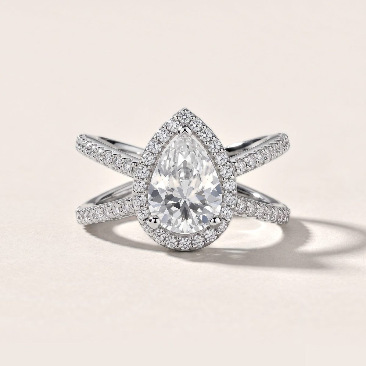 Sparks Crossover Halo Pear Diamond Engagement Ring in Silver - front.jpg